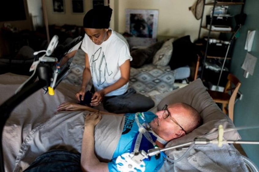 French musician Guilhem Gallart, a member of the Fonky Family, is seen here with his partner Wahiba; he was diagnosed with ALS in 2015