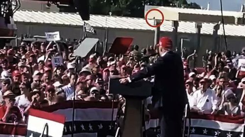 new video emerges of shooter running across roof as trump is speaking