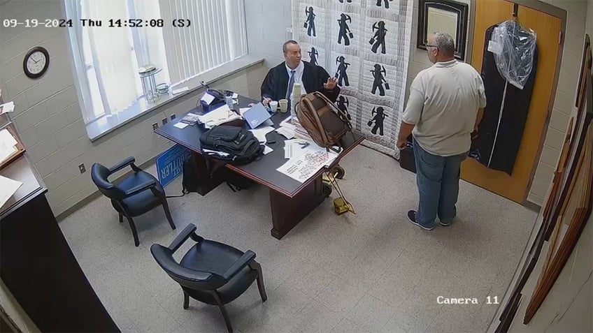 Kentucky sheriff and a judge moments before the alleged killing of the judge