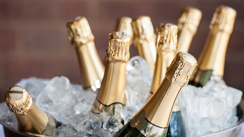 Champagne bottles in bucket of ice