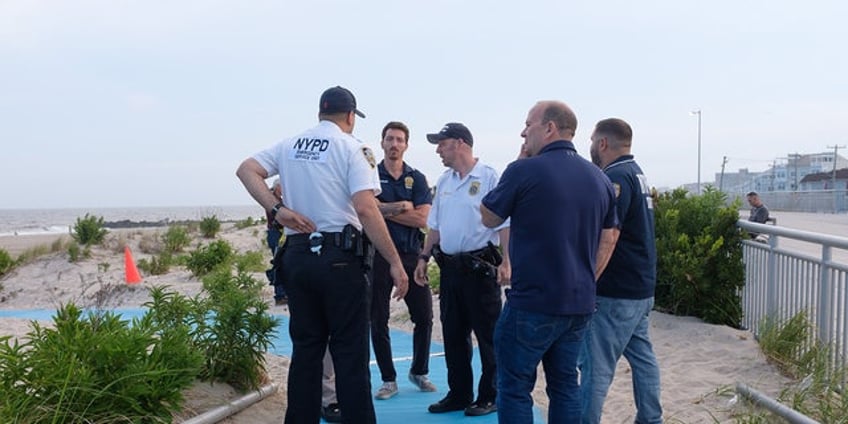 new york beach reopens for the first time since unprecedented shark attack on swimmer