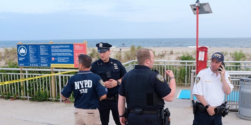 new york beachgoers pulled from water days after woman attacked by shark lost 20 ibs of flesh