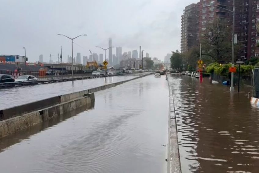 new york city area gets one of its wettest days in decades as rain swamps subways and streets