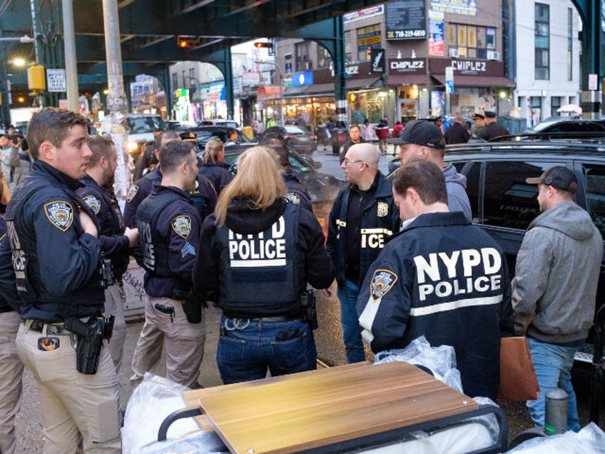 Police raid a suspected brothel on Roosevelt Avenue and 95th Street in Corona, Queens, New