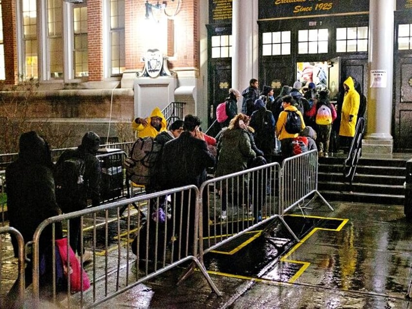 UNITED STATES -January 9: Migrants evacuated from Floyd Bennett Field arrive at James Madison High School on Bedford Avenue in Brooklyn, New York City during a storm on Tuesday, January 9, 2024. (Photo by Gardiner Anderson for NY Daily News via Getty Images)