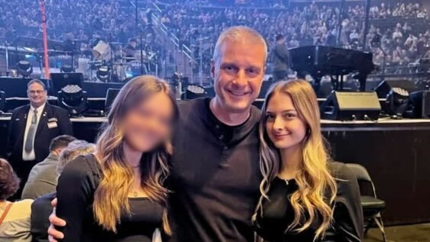 Jim Kropf and his two daughters