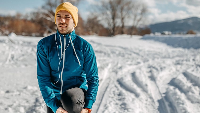 Man running in snow