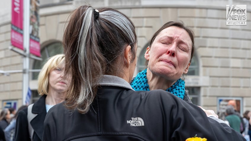 USAID workers leave HQ in DC after being laid off on the advice of DOGE