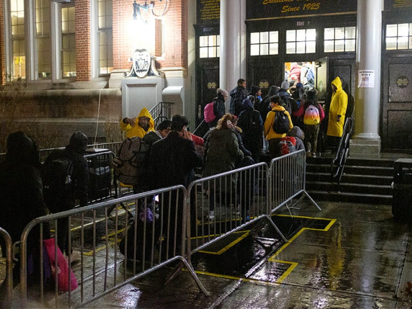 UNITED STATES -January 9: Migrants evacuated from Floyd Bennett Field arrive at James Madison High School on Bedford Avenue in Brooklyn, New York City during a storm on Tuesday, January 9, 2024. (Photo by Gardiner Anderson for NY Daily News via Getty Images)