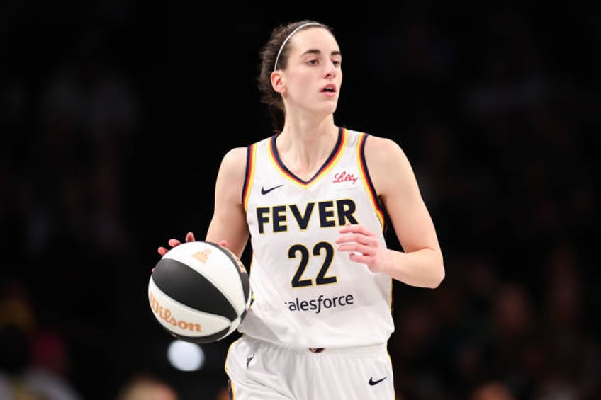 Caitlin Clark of the Indiana Fever dribbles the ball against the New York Liberty during the second half at Barclays Center on June 02, 2024 in New...