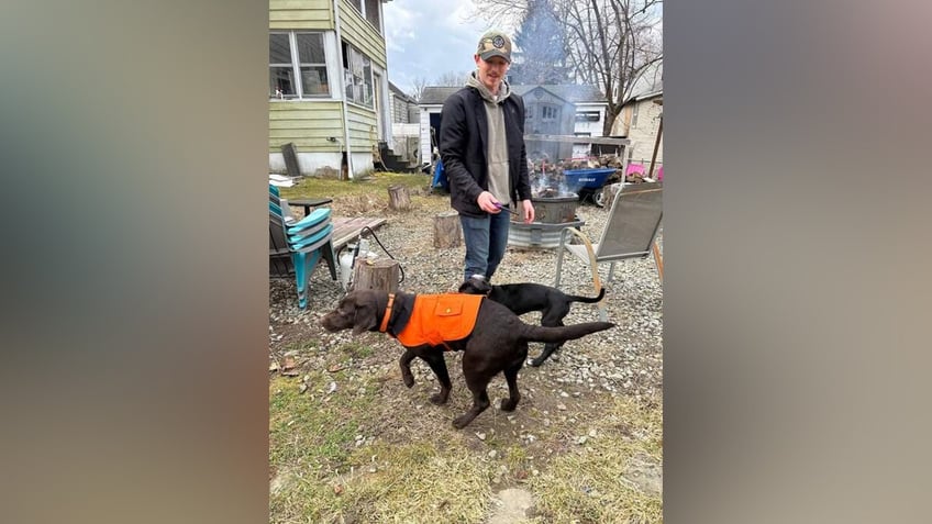 Tyler Beschorner and a dog