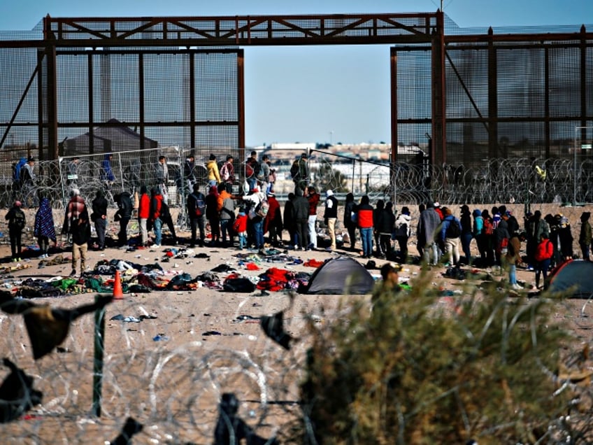 CIUDAD JUAREZ, MEXICO - DECEMBER 27: People camp as they wait to cross the border between Mexico and the United States in Ciudad Juarez, Mexico on December 27, 2023. US Secretary of State Antony Blinken led the US delegation to meet Mexican President Andres Manuel Lopez Obrador as the pressure intensifies on the White House to handle the migration issue at the southern border. (Photo by Christian Torres/Anadolu via Getty Images)