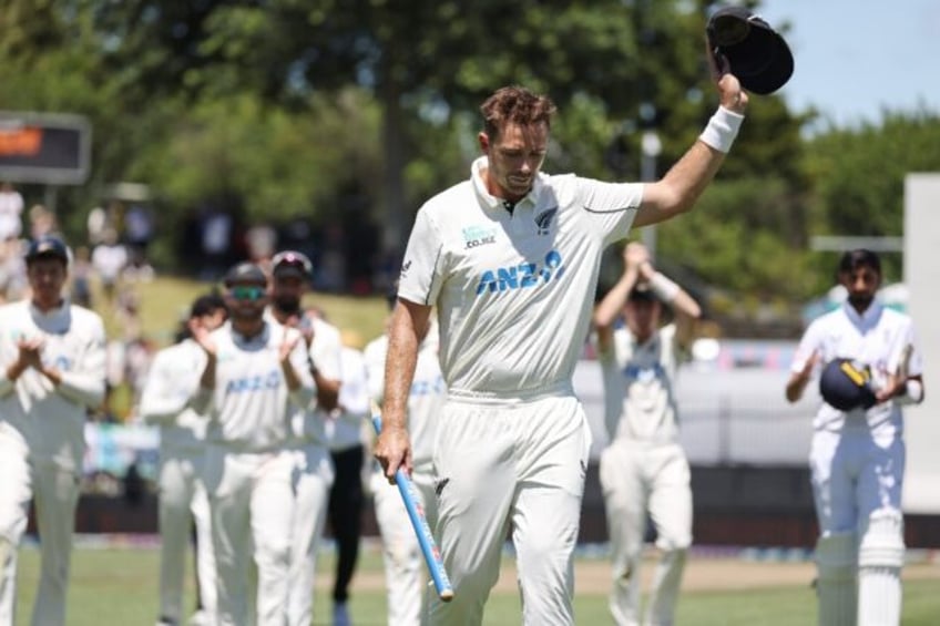 New Zealand’s Tim Southee gestures to the crowd as he leaves the field in his final Test