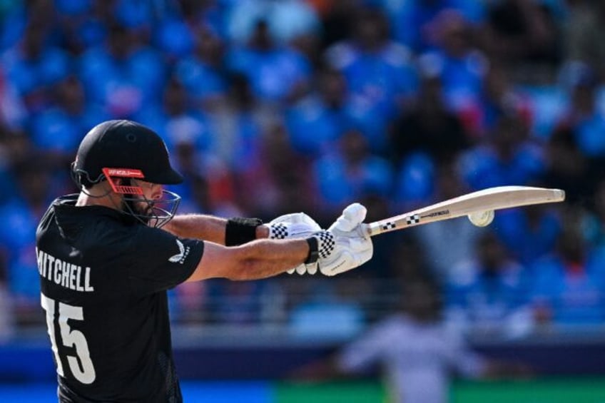 Daryl Mitchell made 63 as New Zealand posted 251-7 in the Champions Trophy final against I