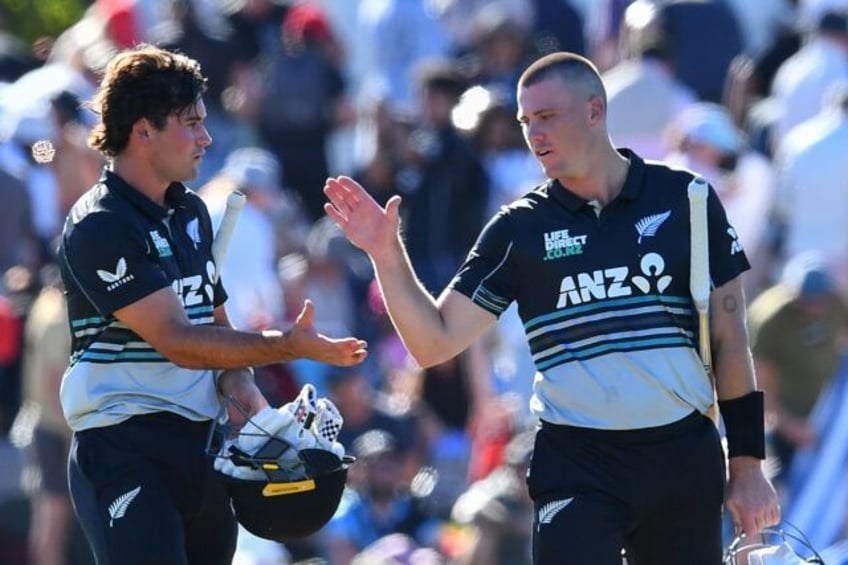 New Zealand's Finn Allen (right) and Tim Robinson celebrate the win against Pakistan