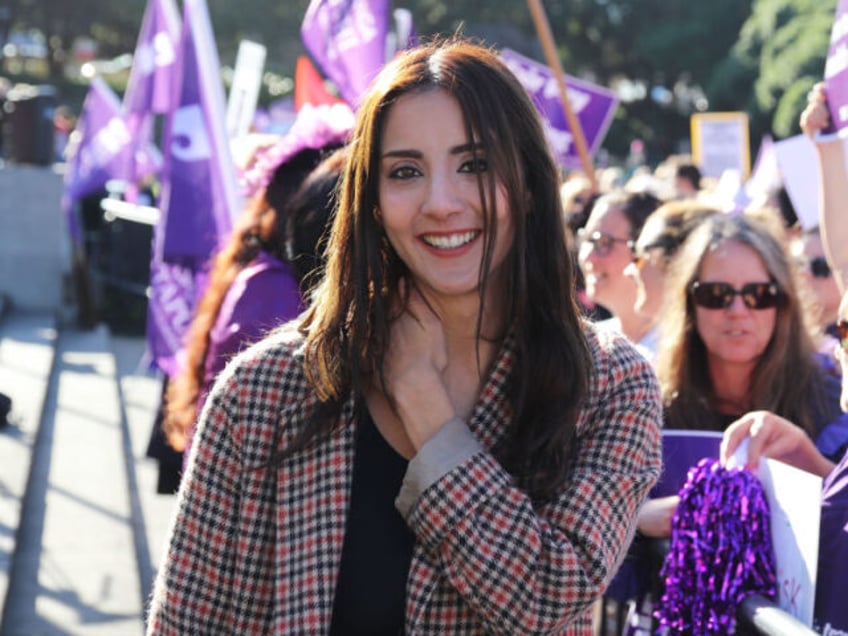 WELLINGTON, NEW ZEALAND - June 9: Green Party MP Golriz Ghahraman after speaking with striking healthcare workers on June 09, 2021 at Parliament in Wellington, New Zealand on June 09, 2021. About 30,000 members of the New Zealand Nurses' Organisations are striking from 11am to 7pm across New Zealand calling …