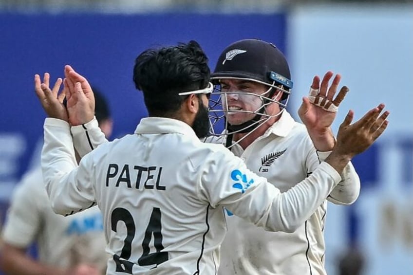 New Zealand's Tom Latham (R) with his teammate Ajaz Patel; the India Test opener begins in