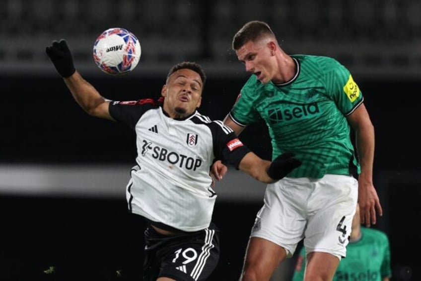 Newcastle defender Sven Botman (right) is set for 6-9 months out with an ACL injury