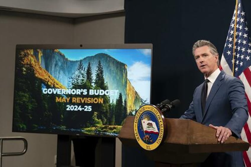 newsom forced to slash california budget blames crippling deficit on rain bombs and tax shortfalls