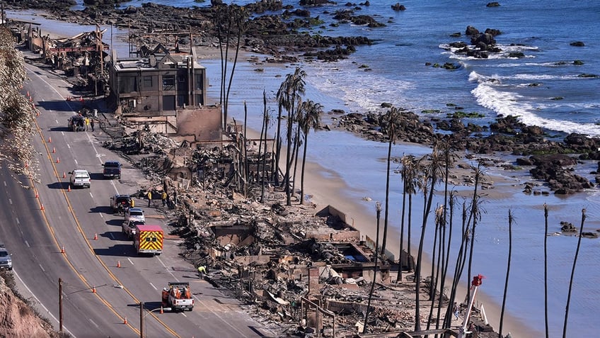 Homes along Pacific Coast Highway are seen burned by the Palisades Fire on Sunday, Jan. 12, 2025 in Malibu, California.