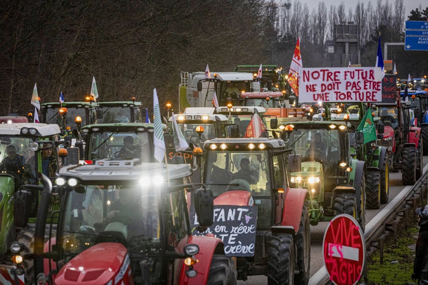 STRASBOURG, FRANCE - JANUARY 30: Farmers take part in a protest called by local branches of major farmer unions FNSEA and Jeunes Agriculteurs, blocking the A35 highway with tractors near Strasbourg, France, on January 30, 2024. Protests continue nationwide, called by several farmers unions on pay, tax and regulations. (Photo by Sathiri Kelpa/Anadolu via Getty Images)