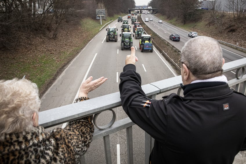 STRASBOURG, FRANCE - JANUARY 30: Farmers take part in a protest called by local branches of major farmer unions FNSEA and Jeunes Agriculteurs, blocking the A35 highway with tractors near Strasbourg, France, on January 30, 2024. Protests continue nationwide, called by several farmers unions on pay, tax and regulations. (Photo by Sathiri Kelpa/Anadolu via Getty Images)