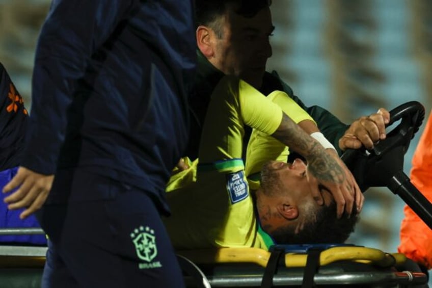 neymar has torn knee ligament facing surgery