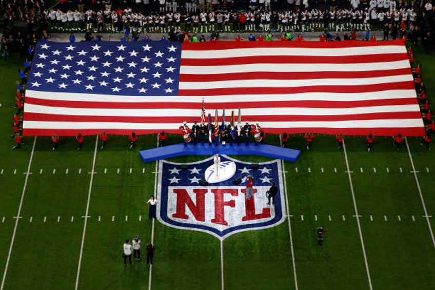 Pink sings the national anthem prior to Super Bowl LII between the New England Patriots and the Philadelphia Eagles at U.S. Bank Stadium on February...