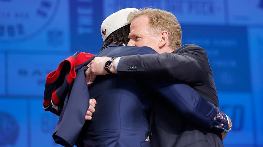 C.J. Stroud hugs Roger Goodell