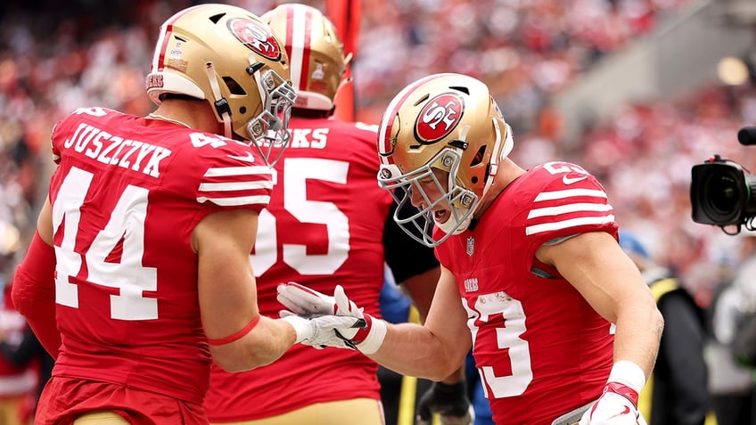 Kyle Juszczyk and Christian McCaffrey