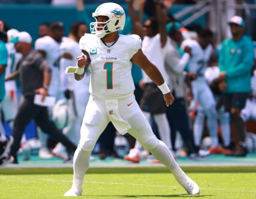 nfl dolphins destroy denver 70 20 bills crush commanders