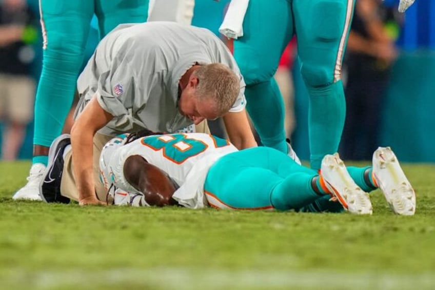 nfl dolphins receiver davis out of hospital after game ending hit