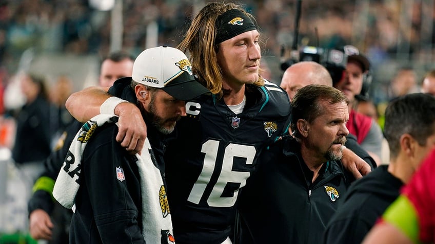 nfl fans hurt for trevor lawrence as he hobbles off field without medical carts help