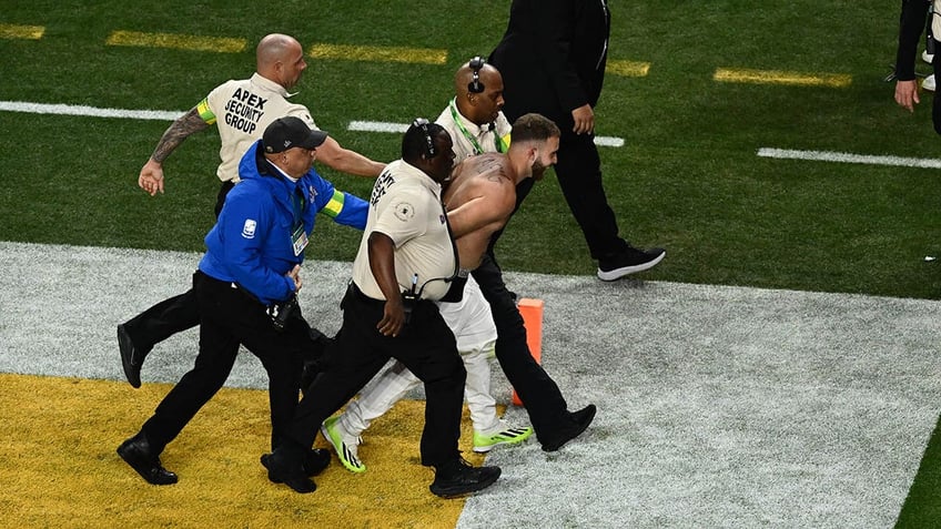 Streaker handcuffed at super bowl