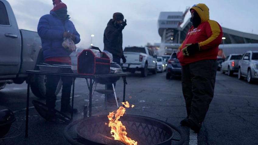 NFL fans build a fire