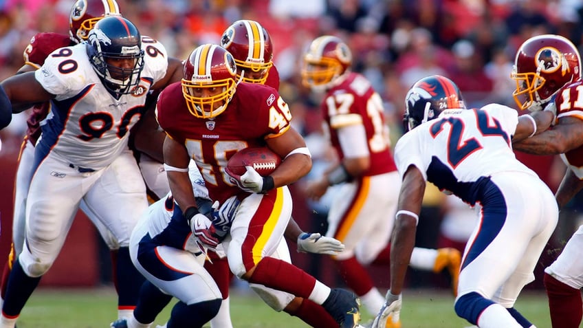 Champ Bailey goes for a tackle