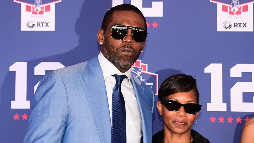 Randy Moss and his wife