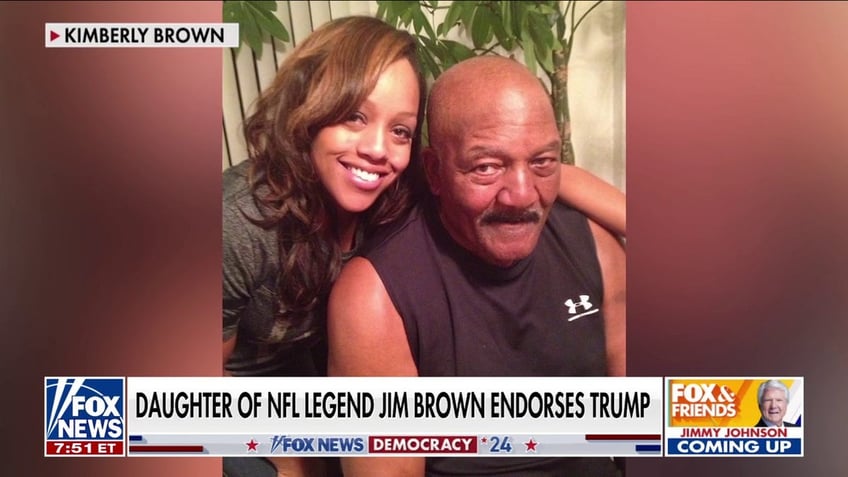 Jim Brown and daughter