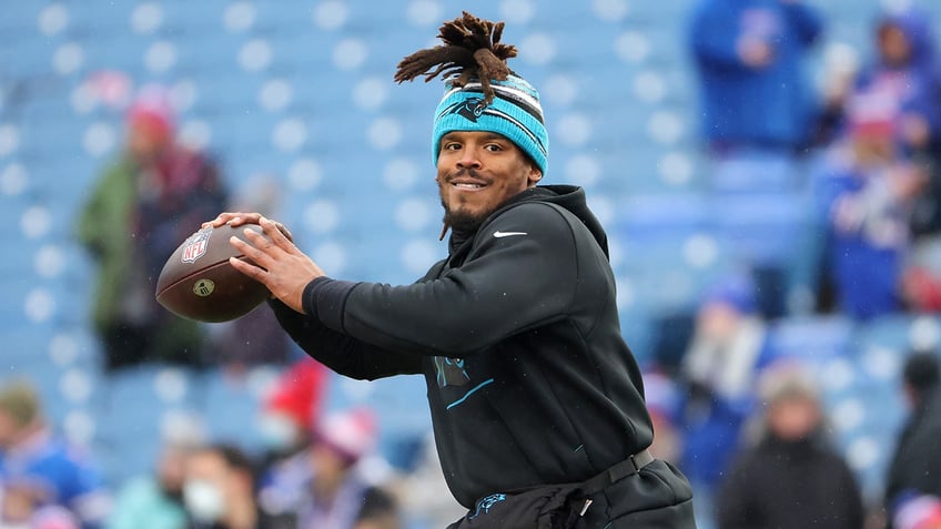 nfl mvp cam newton performs lewd gesture as he zings heckling fans at football camp