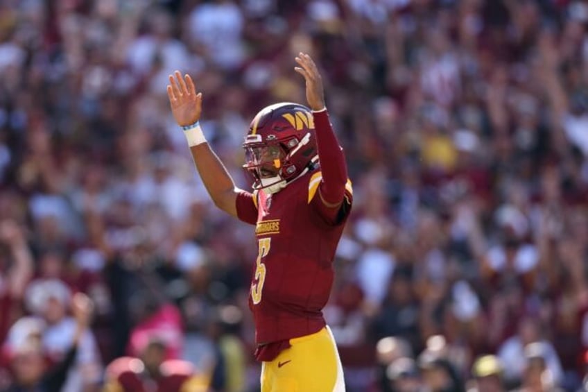 NFL rookie quarterback Jayden Daniels of the Washington Commanders, shown celebrating a to