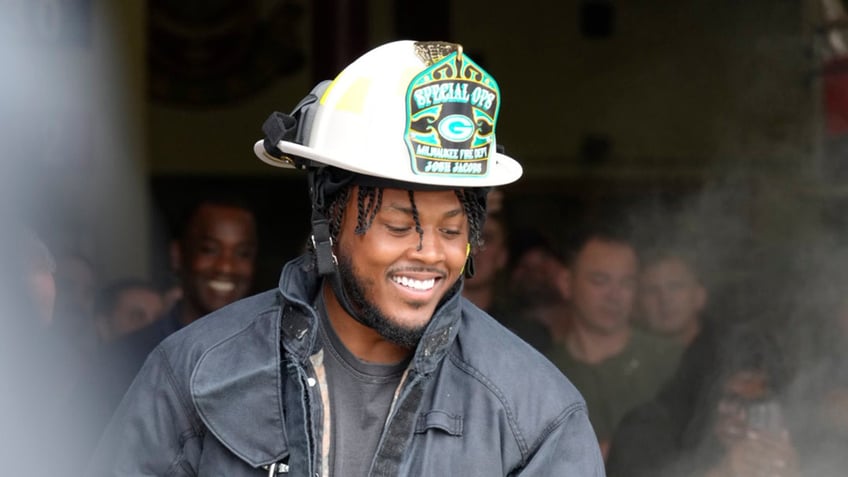 Josh Jacobs in firefighter gear