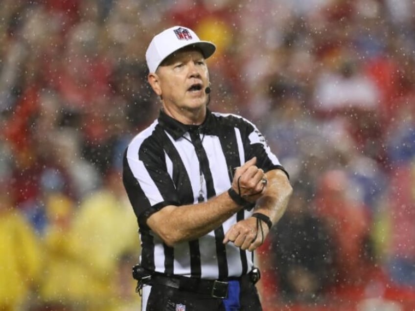 KANSAS CITY, MO - OCTOBER 10: Referee Carl Cheffers calls a critical roughing the pass pen