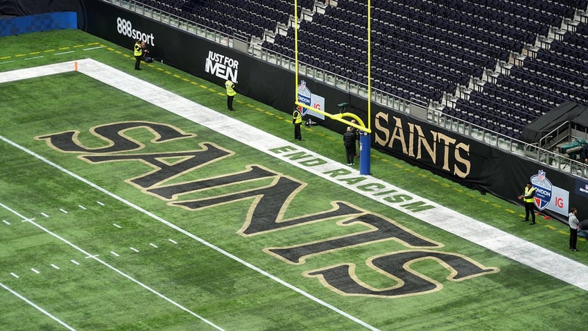 Saints written on field