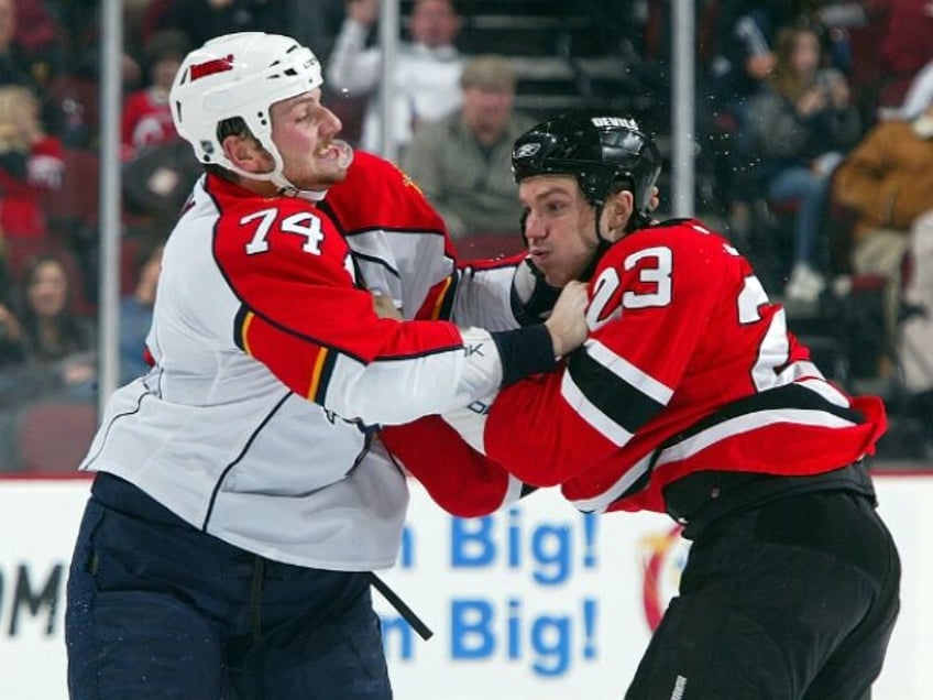 NEWARK, NJ - FEBRUARY 28: David Clarkson #23 of the New Jersey Devils trades punches with