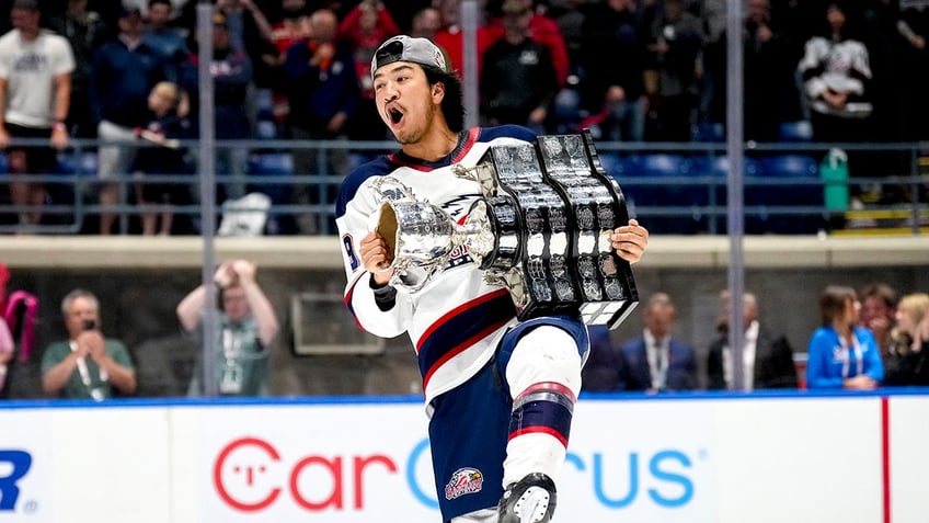 Zayne Parekh with trophy