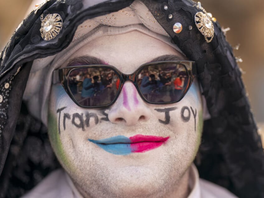 Transgender rights counter protestors disrupt the Let Women Speak rally following the Hate