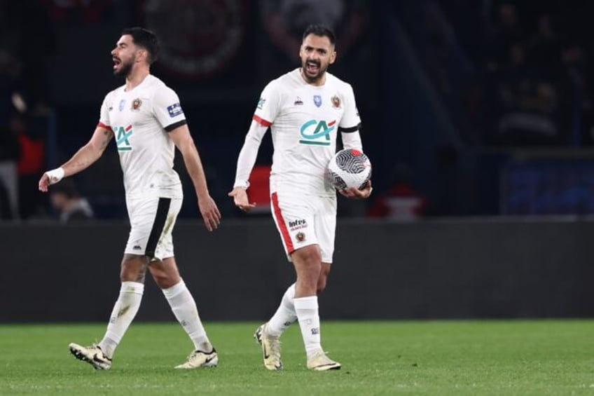 Nice forward Gaetan Laborde (R) reacts after scoring in Wednesday's French Cup defeat agai