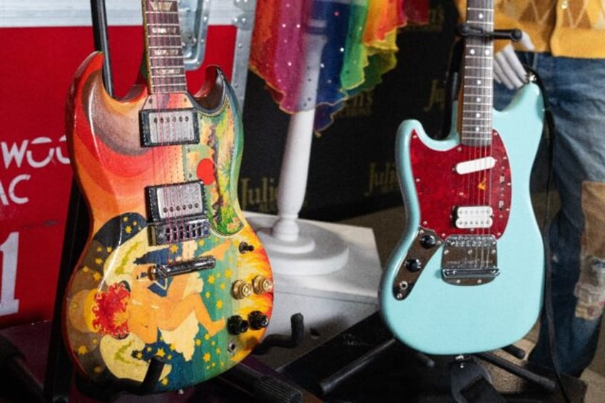 nice pick up guitars owned by clapton cobain hit auction block