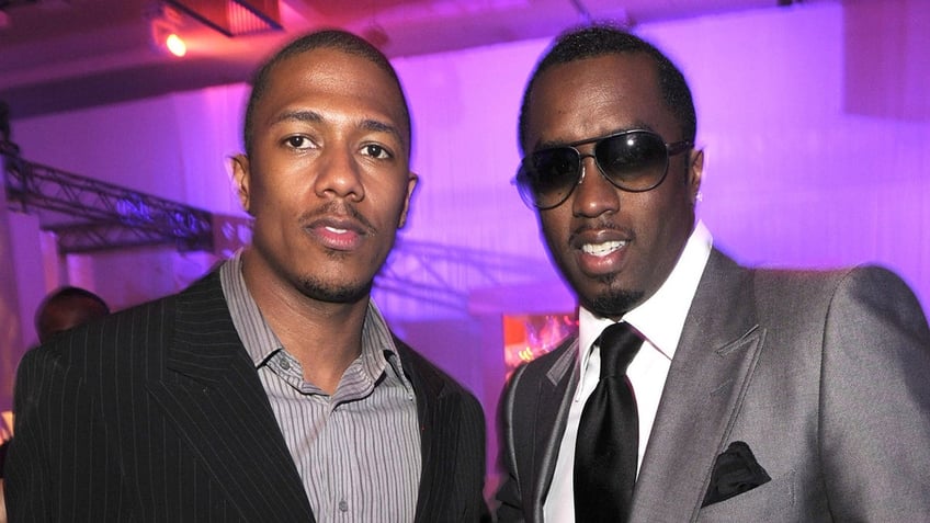 Diddy and Nick Cannon smile in photo op