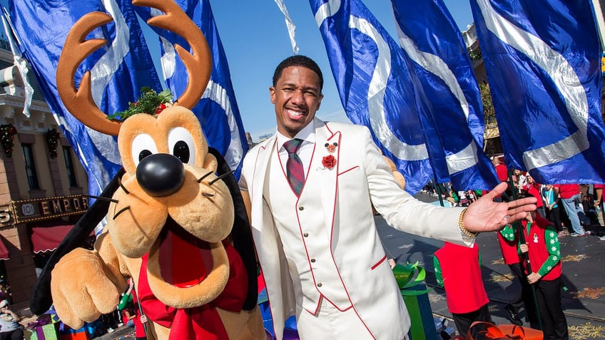 nick cannon reveals he probably spends 200000 a year taking his 12 children to disneyland